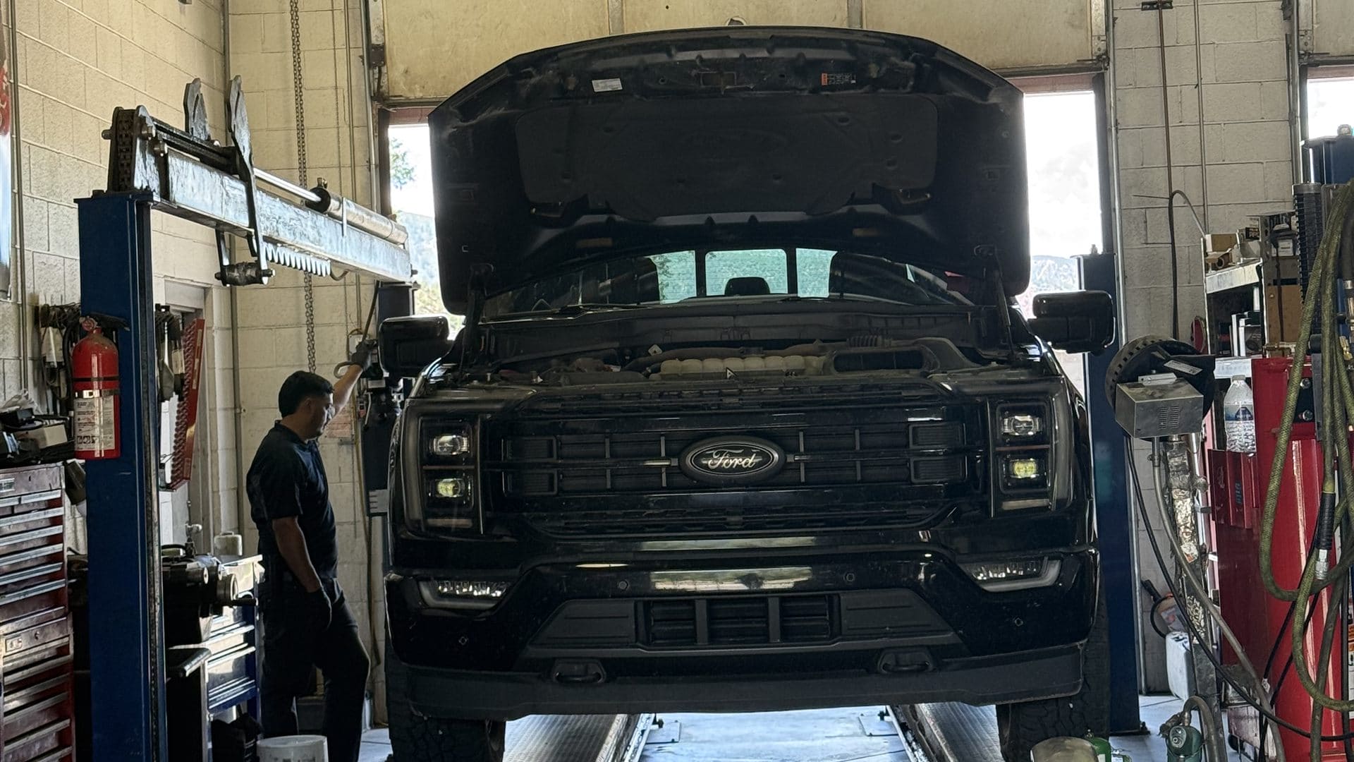 Truck on the lift for brake and battery service